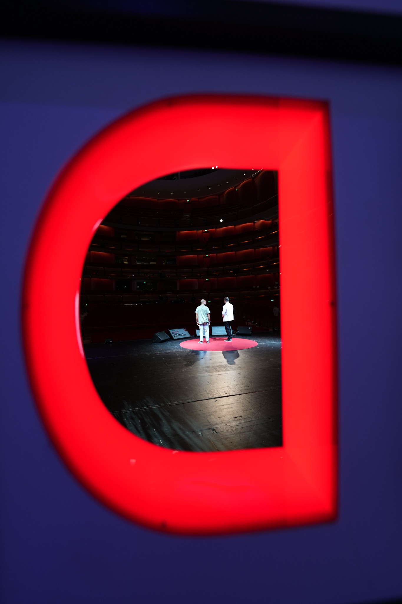 One-to-one coaching in an empty auditorium
